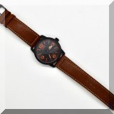 J114. Citizen Eco-Drive watch with brown leather band. Model WR-100. Running. - $68 